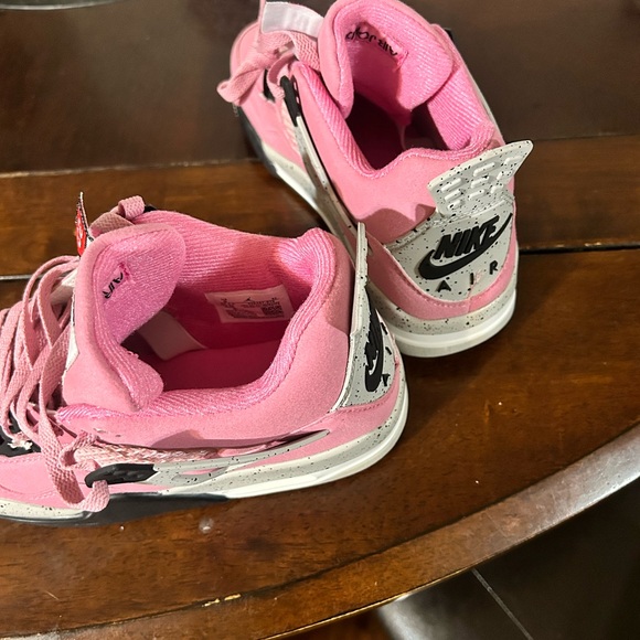 Jordan Pink and Black Athletic Shoes